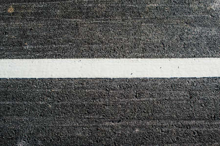 Asphalt with white road lineの写真素材