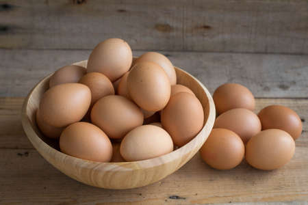 eggs in wooden bowlsの写真素材