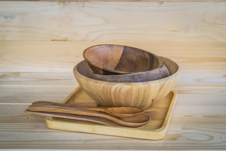 wooden bowl on wooden backgroundの写真素材