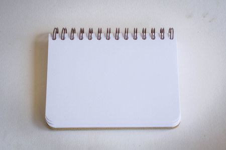 notebook and pencil  on wooden
