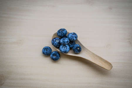 Organic blueberries in white bowlの写真素材