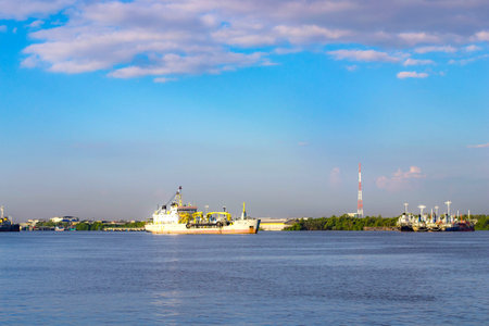 Industry boat floating in riverの写真素材
