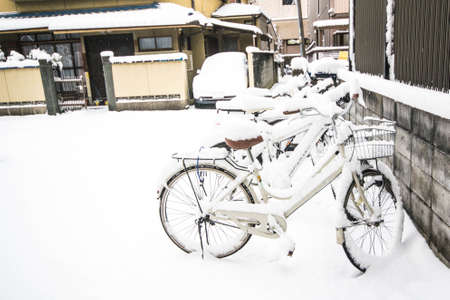 Bicycles are covered with snowの写真素材