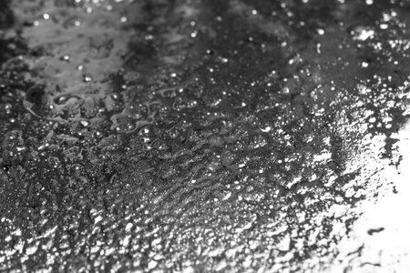 The surface of the oil is light reflecting
