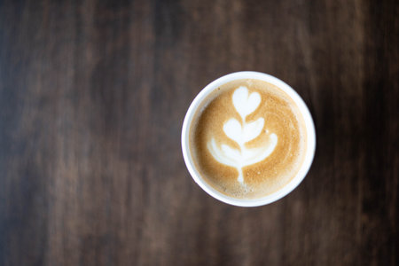 Hot latte coffee in biodegradable recycled glass paper