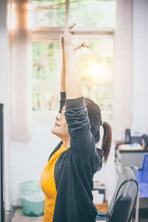 Office workers feel relaxed after the job is done.の写真素材