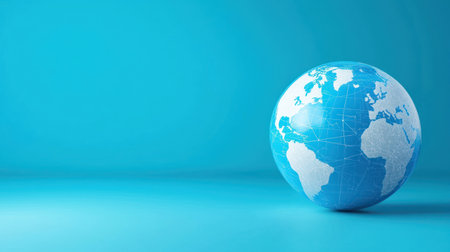 A globe representing global connectivity and data security concepts, set against blue backgroundの素材