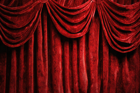 A deep red velvet curtain backdrop with soft folds and dramatic highlights creates elegant atmosphere, perfect for theatrical settingsの素材