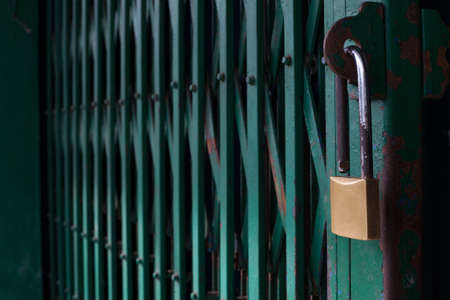 Lock on Green Steel Doorの写真素材