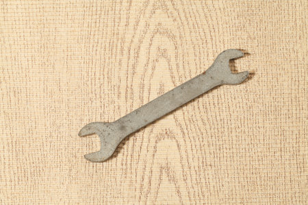 Tool Reapair on Wood Background 