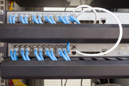 Rack Main Server Internet Connected with LAN cables.の写真素材