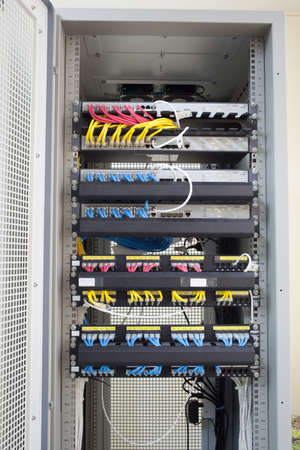 Rack Main Server Internet Connected with LAN cables.の写真素材
