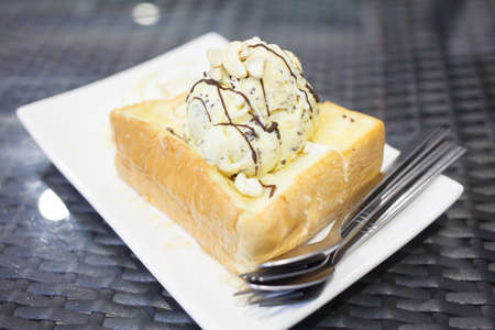 Vanilla Ice Cream put on Breadの写真素材