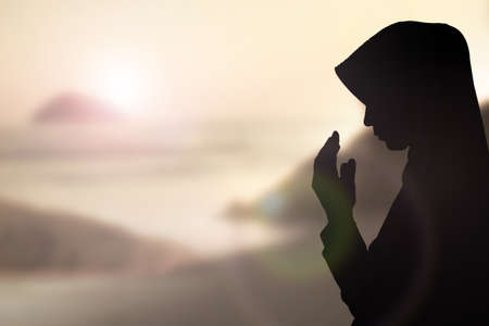 Muslim Woman pray and Beautiful background.の写真素材