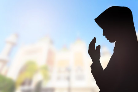 Muslim Woman pray and Beautiful background.の写真素材