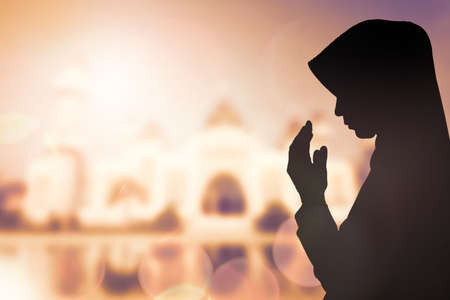 Muslim Woman pray and Beautiful background.の写真素材