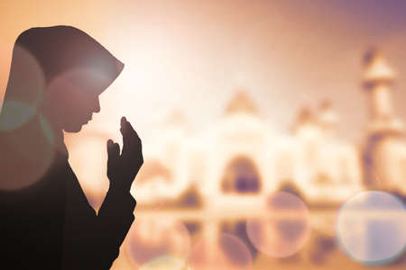 Muslim Woman pray and Beautiful background.の写真素材