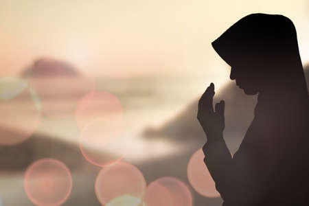 Muslim Woman pray and Beautiful background.の写真素材