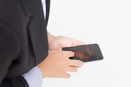 Business woman holding cellphone. の写真素材