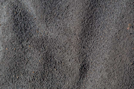 Volcanic sand ground texture of Mount Bromo volcano in Bromo Tengger Semeru National Park, East Java, Indonesia.の写真素材