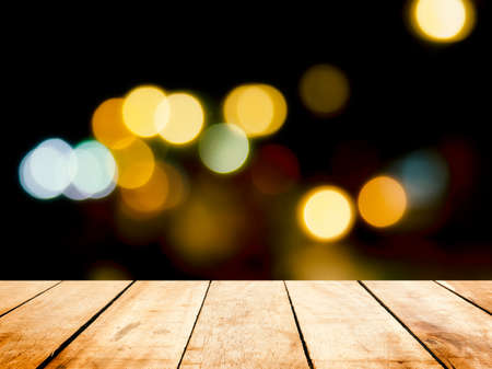 Wooden board table  in front of blurred pattani public mosque background. concept for islam, allah, ramadan, pray, muslim, hope, faith, war, holy.の写真素材
