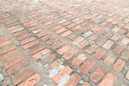 Abstract bricks wall background old  stucco color light gray dirty wreck aged solid dye view red tile new rock floor clean rusty brown wide fog mist seam textured rectangle square pieces interior clayの写真素材