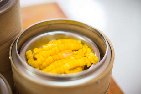 Handmade dim sum in bamboo steamer in chinese restaurantの写真素材