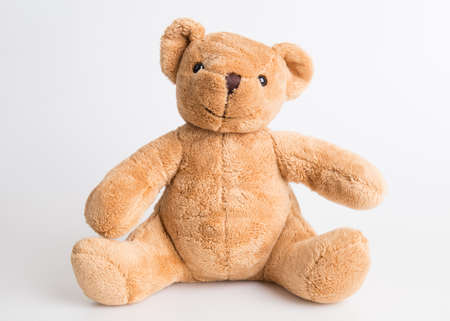 Teddy Bear on Isolate background. bow cute art nice love floor baby play child one joy doll studio toy object animal concept romantic retro worry young give apologize forgiveness plush single babe old whiteの写真素材