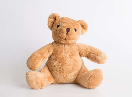 Teddy Bear on Isolate background. bow cute art nice love floor baby play child one joy doll studio toy object animal concept romantic retro worry young give apologize forgiveness plush single babe old whiteの写真素材