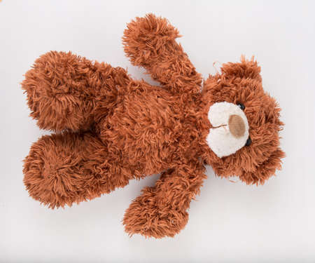 Teddy Bear on Isolate background. bow cute art nice love floor baby play child one joy doll studio toy object animal concept romantic retro worry young give apologize forgiveness plush single babe old whiteの写真素材
