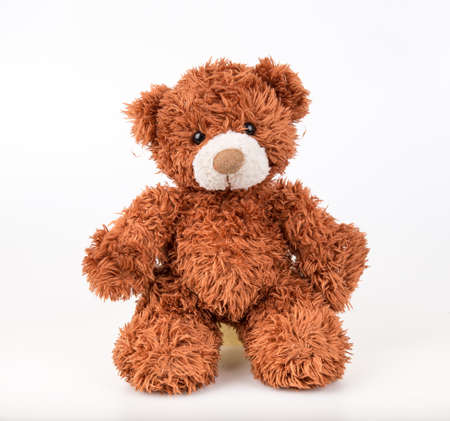 Teddy Bear on Isolate background. bow cute art nice love floor baby play child one joy doll studio toy object animal concept romantic retro worry young give apologize forgiveness plush single babe old whiteの写真素材