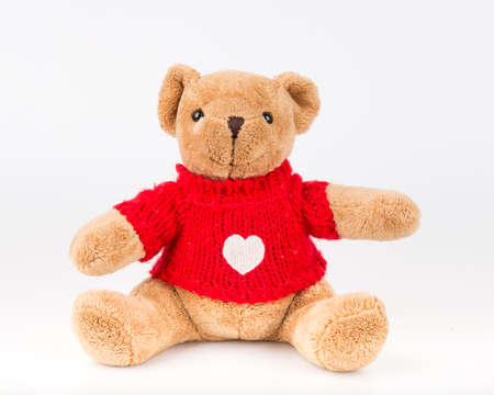 Teddy Bear on Isolate background. bow cute art nice love floor baby play child one joy doll studio toy object animal concept romantic retro worry young give apologize forgiveness plush single babe old whiteの写真素材