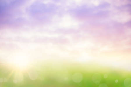 Abstract Blur green dew on grass nature spring on blue sky scene background concept for world environment day, Love Earth Christian holy spirit background, Blurry focus Spring Season garden clean viewの写真素材
