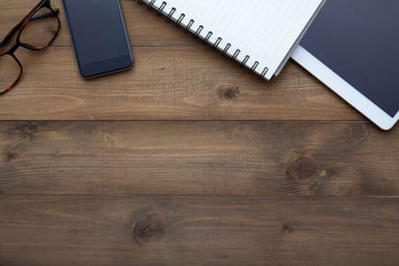 Vintage white paper smartphone mockup flat lay on old table top wood background texture space concept workspace office blank note, plan on calendar new year 2019, business blogger idea empty text viewの写真素材