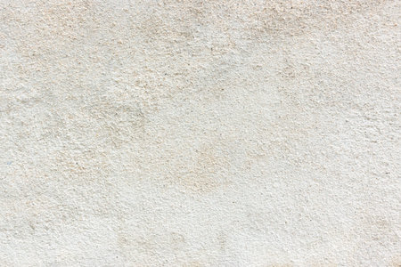 Modern grey paint limestone texture background in white light seam home wall paper. Back flat subway concrete stone table floor concept surreal granite quarry stucco surface background grunge pattern.の写真素材