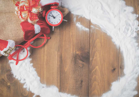 Vintage Bauble Christmas celebration on wood table top view background concept for clock countdown decoration on empty rustic desk with snow, Merry Christmas and Happy new year mockup product cardの写真素材