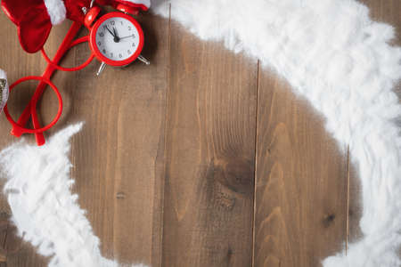 Vintage Bauble Christmas celebration on wood table top view background concept for clock countdown decoration on empty rustic desk with snow, Merry Christmas and Happy new year mockup product cardの写真素材