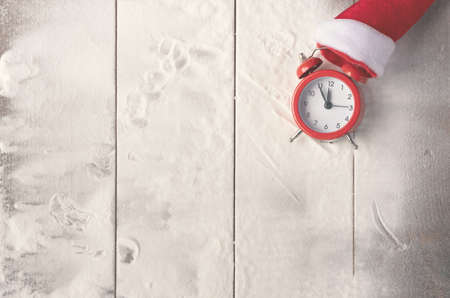 Vintage Bauble Christmas celebration on wood table top view background concept for clock countdown decoration on empty rustic desk with snow, Merry Christmas and Happy new year mockup product cardの写真素材
