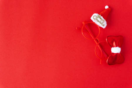 Creative flat lay vintage clock on red office table top view background concept alarm clock on red paper color with copy space in minimal style, empty template for text, break workplace at noon for lunch, back to school.の写真素材