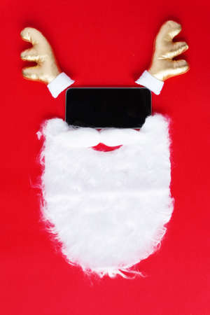 Creative flat lay vintage clock on red office table top view background concept alarm clock on red paper color with copy space in minimal style, empty template for text, break workplace at noon for lunch, back to school.の写真素材