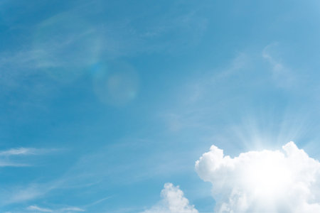 Summer blue sky soft clear Cloudy background. Puffy Cloud move by windy on beach concept Felling good-tempered relaxing  sunset wallpaper, sunrise journey to travel in tropical fog shiny mist style.の写真素材