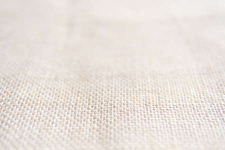 Back brown Fabric canvas texture background with blank space for text design. Clean yellow beige Hessian sackcloth wool pleat woven concept cream sack pattern color, retro plain cotton cloth.の写真素材