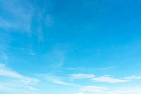 Summer blue sky soft clear Cloudy background. Puffy Cloud move by windy on beach concept Felling good-tempered relaxing  sunset wallpaper, sunrise journey to travel in tropical fog shiny mist styleの写真素材