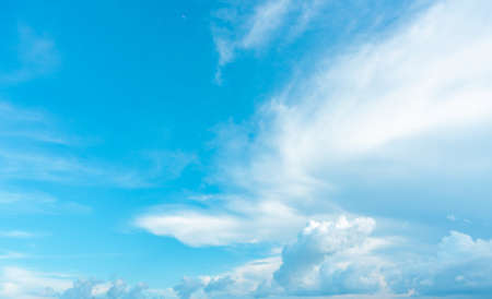 Summer blue sky soft clear Cloudy background. Puffy Cloud move by windy on beach concept Felling good-tempered relaxing  sunset wallpaper, sunrise journey to travel in tropical fog shiny mist styleの写真素材