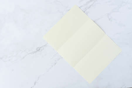 Vintage white do list paper mockup flat lay on old table top marble background texture space concept workspace office blank note, plan on calendar new year 2019, business blogger idea empty text Brochure viewの写真素材