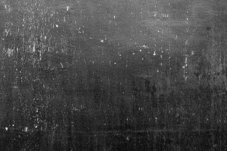 Blank front Real black chalkboard background texture in college concept for back to school kid wallpaper for create white chalk text draw graphic. Empty old back wall education blackboard.の写真素材