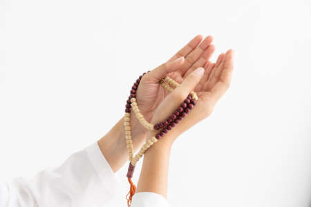 Silhouette young female muslim prayer with hijab praying to God front of landscape view concept for eid mubarak, life and soul fasting of international islamic ramadan, Namaz.の写真素材