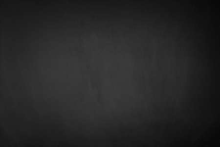 Blank front Real black chalkboard background texture in college concept for back to school kid wallpaper for create white chalk text draw graphic. Empty old back wall education blackboard.の写真素材