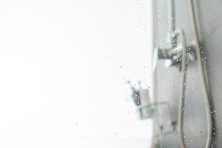 Abstract blurred bathroom interior Background. Empty white marble tile for product display with...