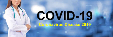 Coronavirus pandemic disease on blur hospital laboratory panoramic blue background. COVID-19 virusの写真素材